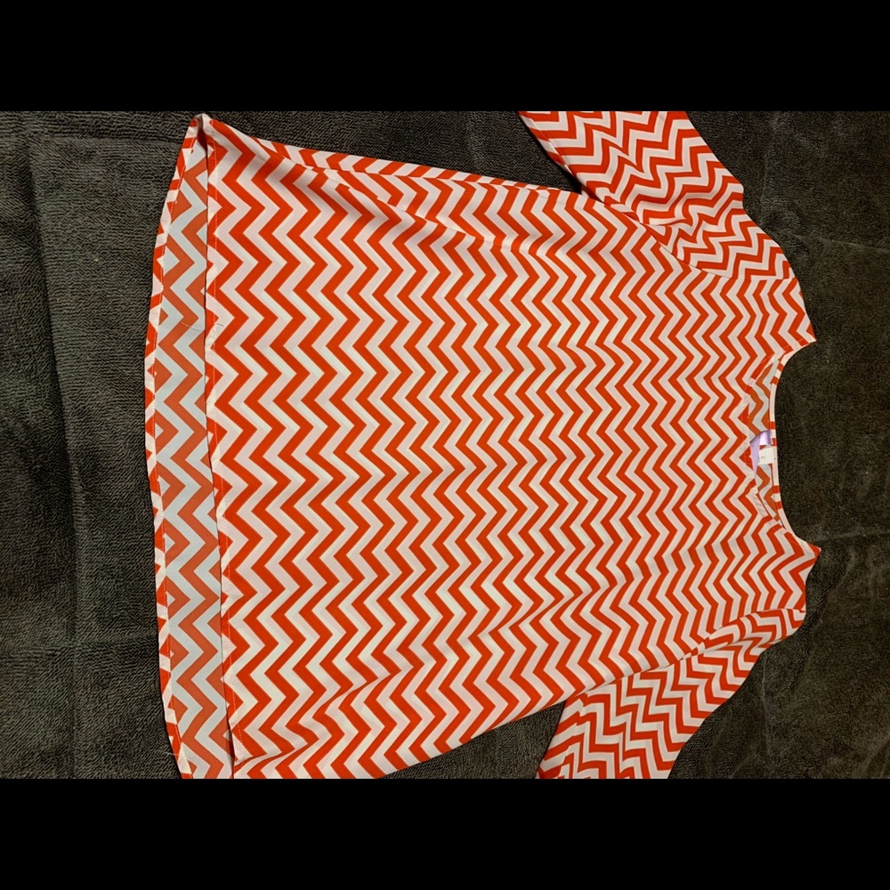 3/4 length sleeve shirt.